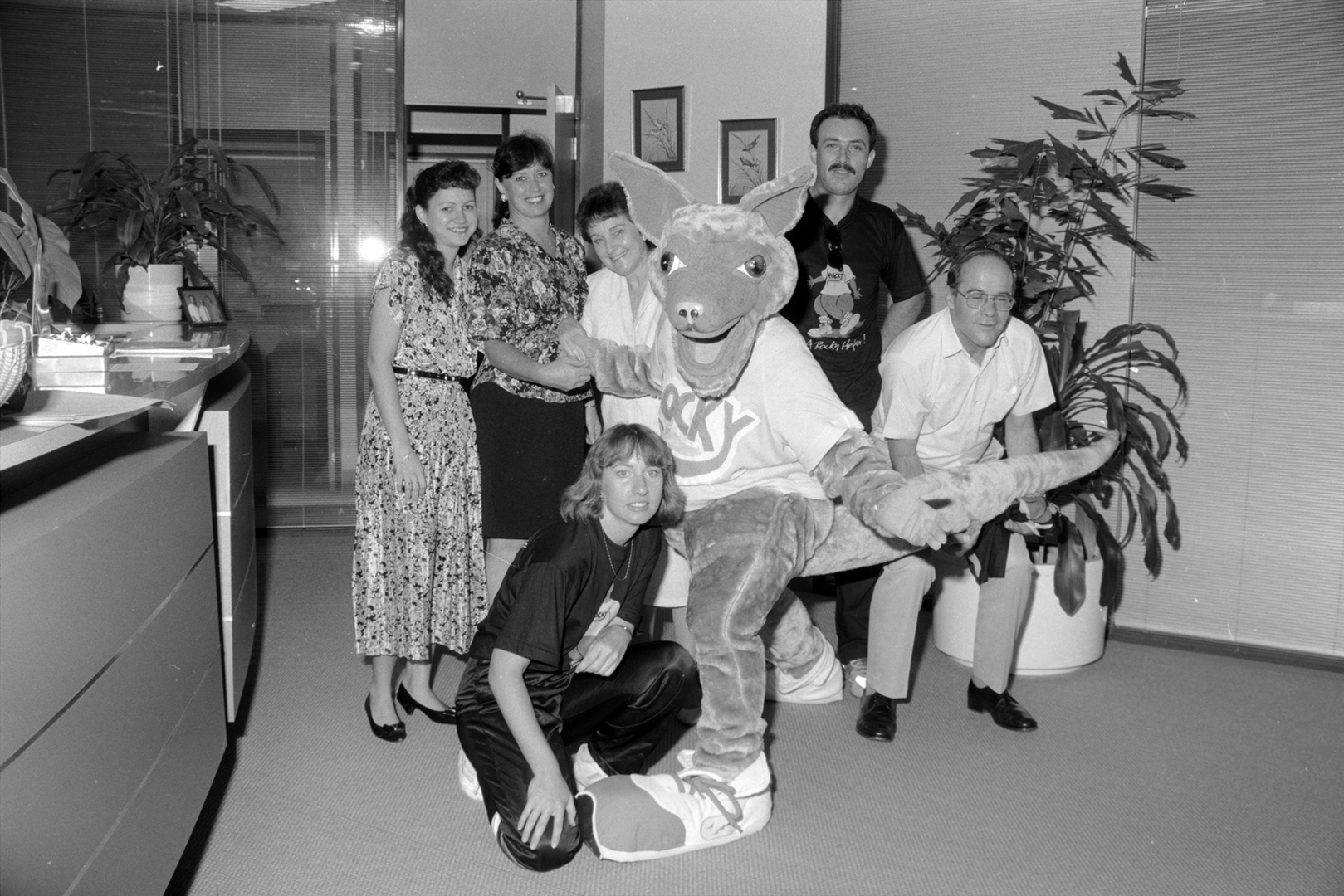 Arafura Sports Festival mascot with staff, 11 April 1991<br>Image courtesy of Library & Archives NT, Department of the Chief Minister, NTRS 3823 P1, Box 11, BW2963, Image 24a